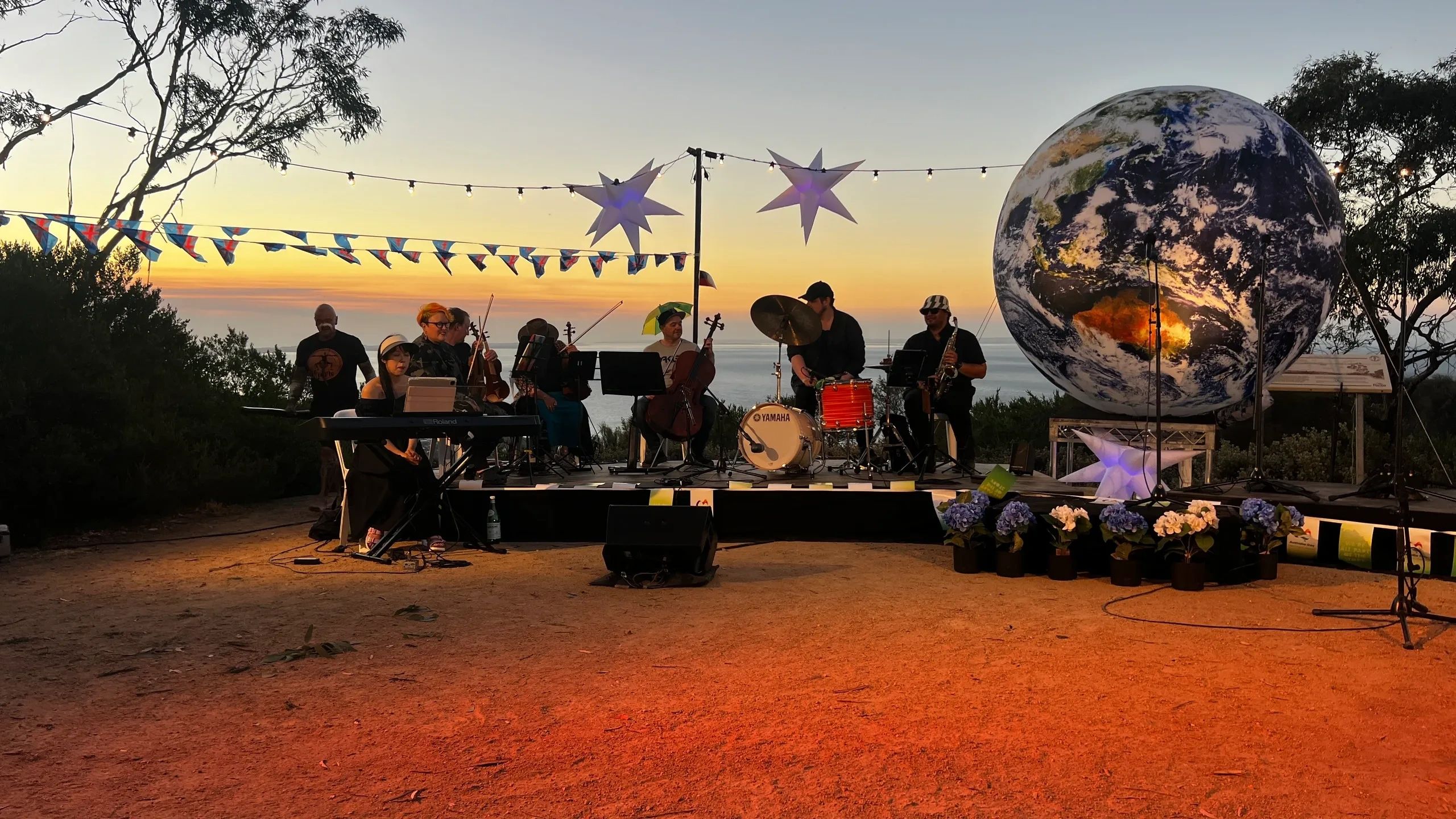 Sunset ceremony performance overlooking the coast
